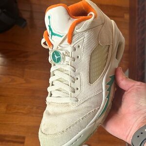 Nike Jordan V Low Golf Shoes - Cream, with blue and orange finish.